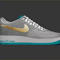 Gray Sports Shoes With Gold Side Accents White Laces And Teal Soles