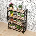 Garden Decorative Multi Tiered Shelf Holding Various Potted Plants With Colorful Pots And Geometric Wall