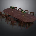 Oval Wooden Dining Table With Eight Wooden Chairs And Green Candlesticks