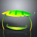 Green And Yellow Leaf Shaped Top Swing With Curved Frame And Hanging Seat