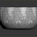 Intricate Carved Silver Bowl Sculpture With Detailed Patterns And Reflective Surface