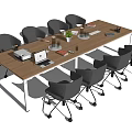 Modern Conference Table With Gray Office Chairs Laptop Coffee Cups And Potted Plant