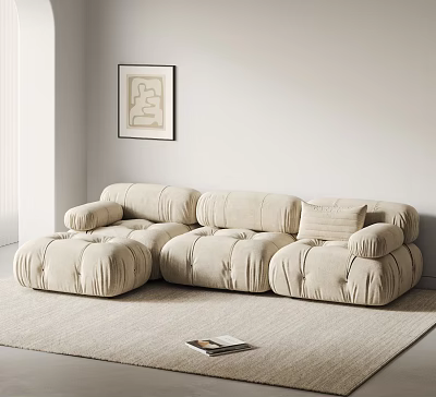 Beige Plush Sectional Sofa In Modern Living Room With Area Rug And Wall Art 3d model