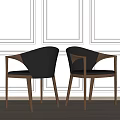 Stylish Black Dining Chairs With Curved Backrest And Wooden Legs Against Paneled Walls And Floor