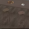 Wooden Bar Stools With Metal Legs Under Wooden Counter And Fruit Plate Coffee Cup