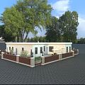 Light Colored Guesthouse Building With Wooden Fence And Green Trees Around Paved Ground