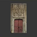 Ornate Architectural Facade Featuring Intricate Carved Details And Red Wooden Door