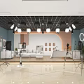 Modern Public Office Space with Lighting Setup Sofa Plants and Photography Equipment