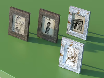 White And Wooden Photo Frames With Various Prints Displayed On Green Table 3d model