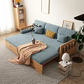 Cozy Living Room With Blue Sofa Wooden Frame Storage Drawers Pillows And Blanket