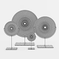 Colorful Decorative Discs On Black Stands With White Background Arrangement