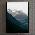 Scenic Mountain Landscape With Snow Capped Peaks And Lush Forest Valley