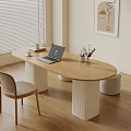 Oval Wooden Desk With White Column Legs Laptop Cup And Small Plant In Minimalist Room