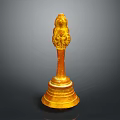 Golden Decorative Sculpture Featuring Intricate Carving And Ornate Base Design