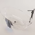 Transparent Bathtub With Modern Metal Faucet And Gray Towel Design