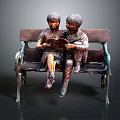 Two Young Men Sitting On Wooden Bench Reading Book Together In Bronze Sculpture