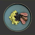 Duck Breast Slices on Blue Plate with Mashed Potatoes and Fruit Sauce