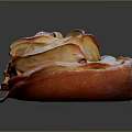 Rose Shaped Apple Pastry Topped With Powdered Sugar On Dark Background