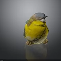 Small Bird Decorative Figurine With Blue Head Yellow Body And Green Wings