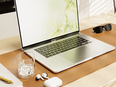 Silver Laptop with Green Leaf Screen on Desk and Iced Glass Sunglasses Pen Wireless Earbuds 3d model