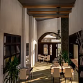 Modern Restaurant Interior With Wooden Herringbone Flooring Counter Tables Chairs Decorative Plants Wall Clocks