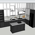 White And Black Kitchen Cabinets With Marble Countertops And Central Island