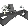 Modern Curved Office Desk With White Vase Green Plant Laptop And Table Lamp