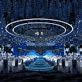 Elegant Blue Themed Banquet Hall with Circular Chandelier White Tables and Floral Decorations
