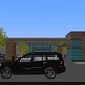 Modern Industrial Factory Building With Surrounding Greenery Parking Lot And Trees