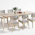 Modern Light Wood Dining Table Set With Six Chairs Vase And Fruits On Top