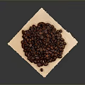 Freshly Roasted Coffee Beans Piled On Parchment Paper With Dark Grey Backdrop
