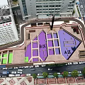 Aerial View of Road Facilities With Colored Zones Parking Areas Vehicles and High Rise Buildings
