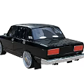 Black Classic Four Door Sedan With Silver Spoke Wheels And Vintage Design