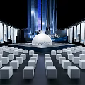 Modern Conference Hall Featuring White Cube Seats Central Spherical Installation And Blue Decorations