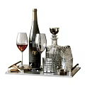 Elegant Wine Bottle and Wine Glasses With Decanter Crystal Glasses And Metal Tray Arrangement