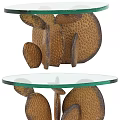 Modern Coffee Table With Glass Top And Textured Metal Base Design