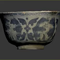 Carved Ceramic Bowl With Blue And White Floral Patterns And Intricate Details