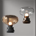 Modern Minimalist Table Lamps With Brown And Clear Glass Shades Illuminated Metallic Base