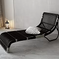 Black Rattan Lounge Chair With White Cushion Gray Wall Floor Lamp And Green Plant