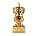 Ornate Classical Gold Clock With Round Dial Winged Angel Figures And Carved Base