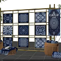 Blue and White Batik Cloths Display on Bamboo Frame With Various Patterns and Baskets 3d model