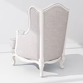 Vintage Style Single Sofa With White Wooden Frame Carved Details And Blue White Floral Cushion