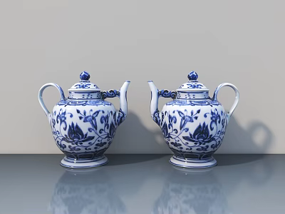 Elegant Blue and White Porcelain Teapots with Floral Patterns on Gray Surface 3d model