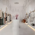 Modern Bright White Clothing Store Spacious Interior Clothing Racks Central Display Table Pink Flowers Accessories