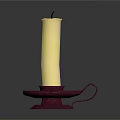 Decorative Yellow Wax Candle Placed On Red Candle Holder With Small Handle