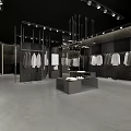 Modern Clothing Store Interior With Clothing Racks Mannequins And Decorative Lighting