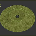 Green Circular Jade Artifact With Central Hole And Intricate Textured Surface