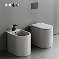 White Modern Toilet In Minimalist Bathroom Interior With White Washbasin And Black Faucet