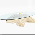 Modern Oval Glass Top Coffee Table With Curved Wooden Base And Tray Of Yellow Fruits