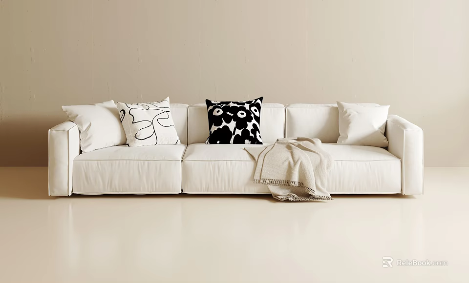 White Three Seater Sofa With Black And White Patterned Cushions And Throw Blanket 3d model